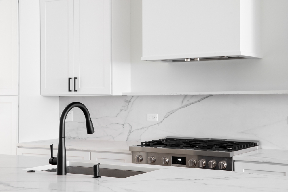 Quartz vs. Granite: The Ultimate Showdown for Kitchen Countertops and Floors